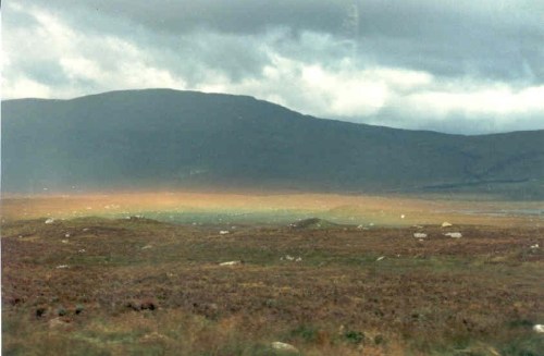 Rainbow in the Highlands, near Glencoe. The "Hail Mary" lucky shot through the bus window